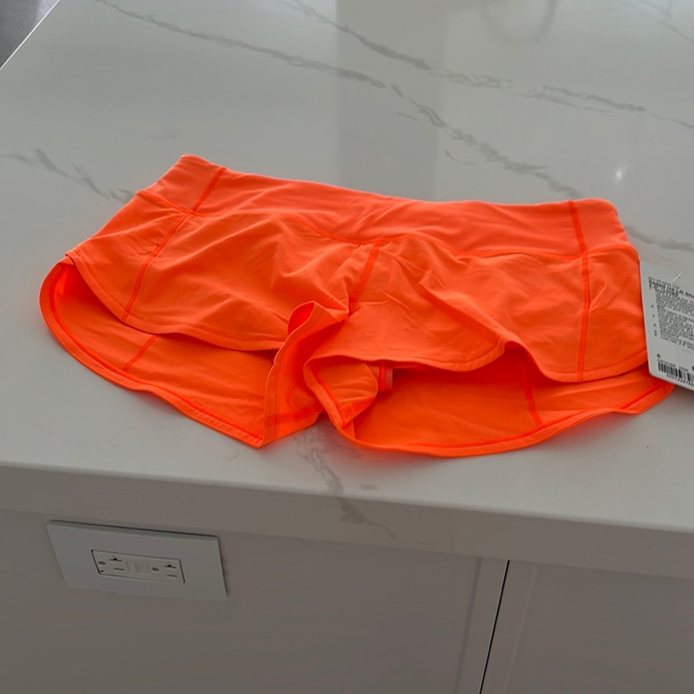 Brand new with tags and never worn Neon orange speed up shirts 2.5 length- l
